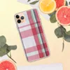 Classic Holiday Plaid Clear Case for iPhone — classic tartan plaid pattern in crimson red, deep navy, forest green