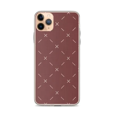 repeating white cross stitch X marks and diagonal dashes arranged in a grid on a deep burgundy red textured background on mockup Crimson Cross Stitch Clear Case - default view