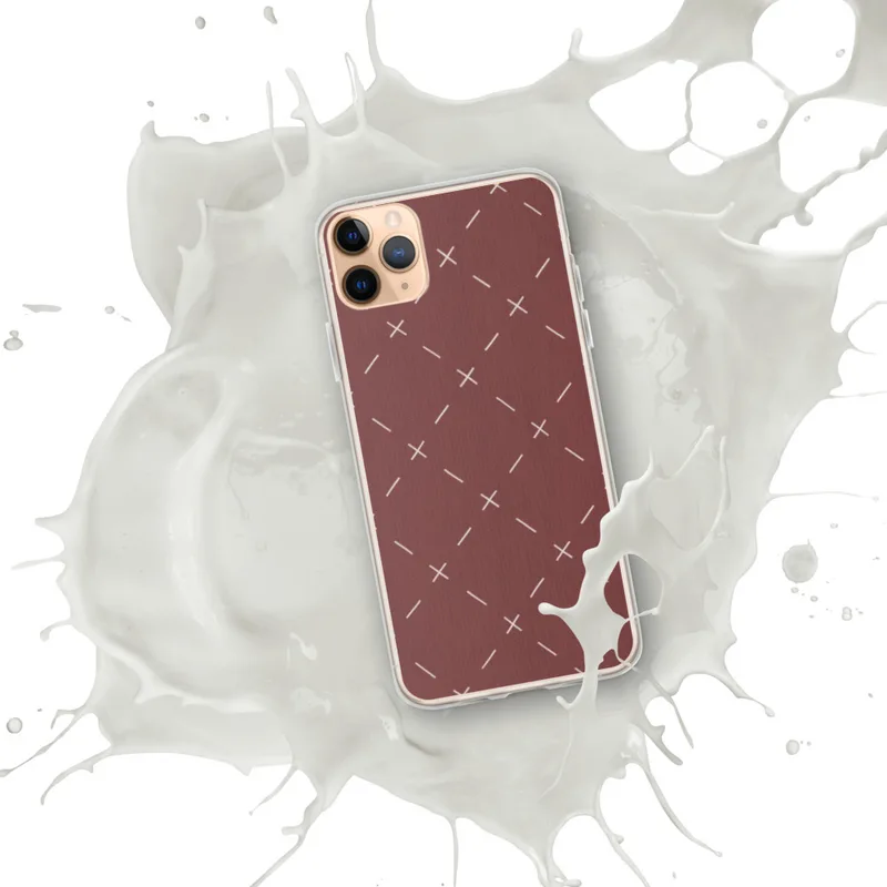 Crimson Cross Stitch Clear Case for iPhone — repeating white cross-stitch X marks and diagonal lines on a rich burgundy-red