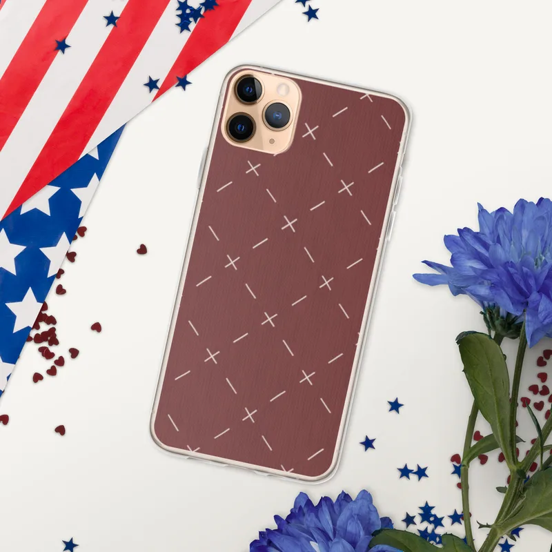 Crimson Cross Stitch Clear Case for iPhone — repeating white cross-stitch X marks and diagonal lines on a rich burgundy-red