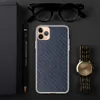 Navy Carbon Fiber Shield Clear Case for iPhone — diagonal twill carbon fiber weave pattern in deep navy blue and slate tones