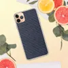 Navy Carbon Fiber Shield Clear Case for iPhone — diagonal twill carbon fiber weave pattern in deep navy blue and slate tones