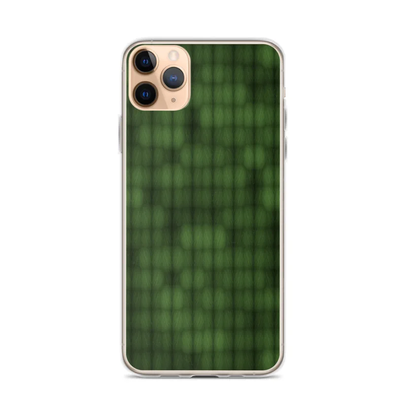 repeating grid of deep olive and emerald green textured cells with a faint skull silhouette emerging from the pattern