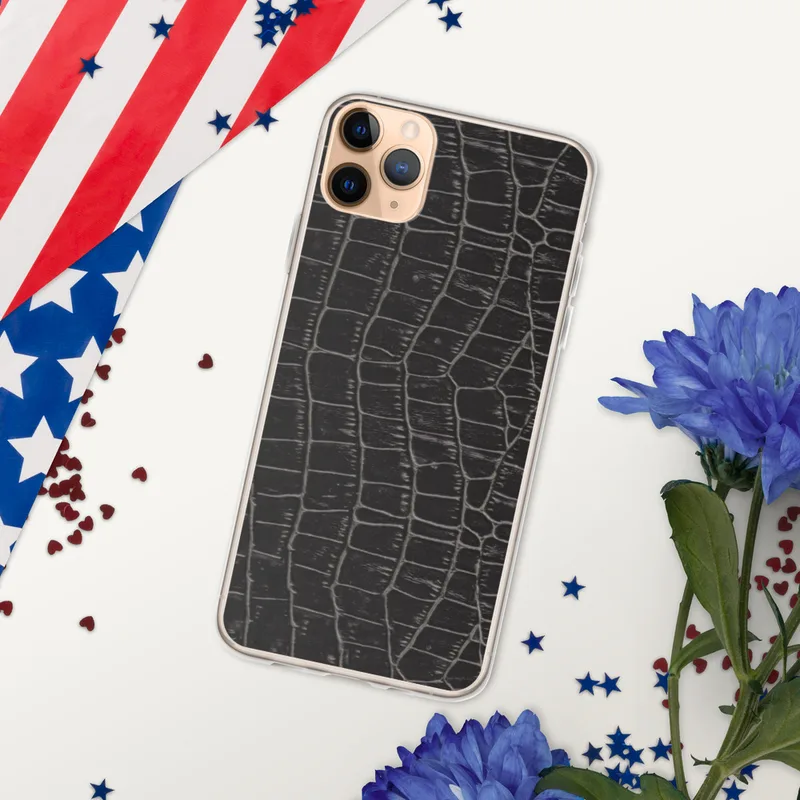 Dark Croc Skin Clear Case for iPhone — close-up black crocodile skin scale pattern with deep charcoal tones and raised gray