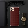 Crimson Lattice Clear Case for iPhone — deep burgundy tufted lattice pattern with diamond grid and subtle floral rosette