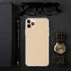 Desert Sand Minimalist Clear Case for iPhone — soft warm beige speckled texture resembling desert sand on a light tan