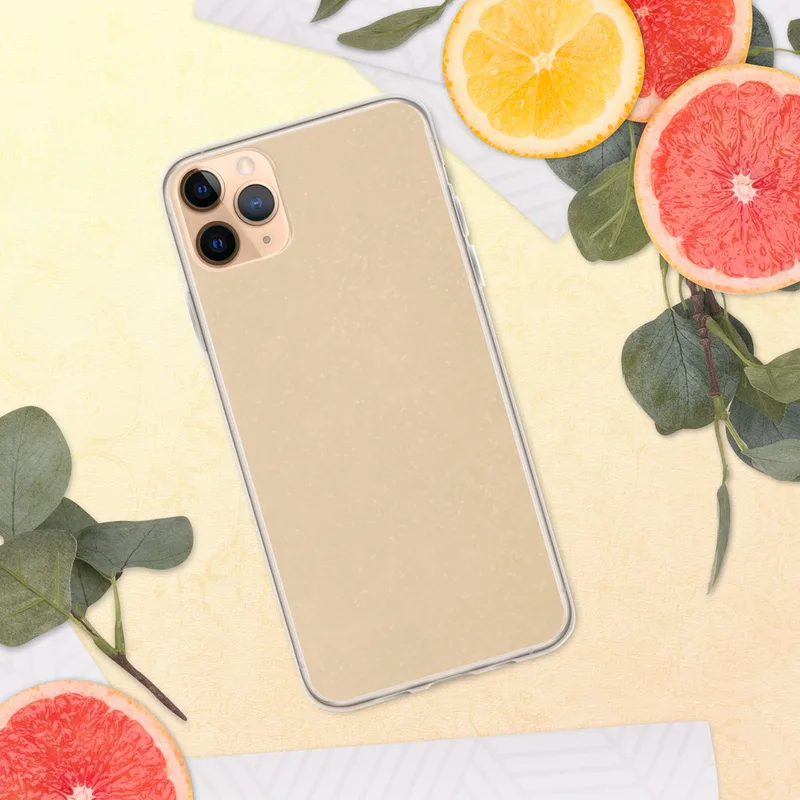 Desert Sand Minimalist Clear Case for iPhone — soft warm beige speckled texture resembling desert sand on a light tan