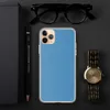 Serene Sky Blue Clear Case for iPhone — solid flat sky blue in a smooth matte-like tone with subtle texture variation across