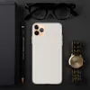 Pure Clarity Minimalist Clear Case for iPhone — fully transparent clear surface with subtle light texture on a neutral