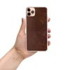 Worn Leather Texture Clear Case for iPhone — distressed dark mahogany leather surface with cracked, aged creasing and warm