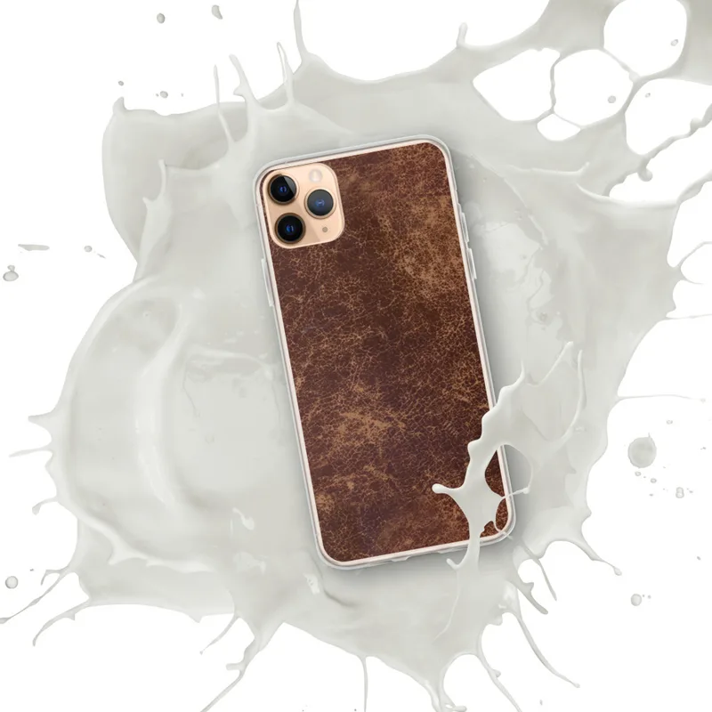 Worn Leather Vintage Clear Case for iPhone — distressed leather texture in deep mahogany and warm tan with crackled surface