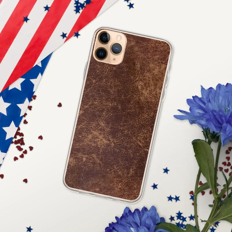Worn Leather Vintage Clear Case for iPhone — distressed leather texture in deep mahogany and warm tan with crackled surface