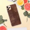 Worn Leather Vintage Clear Case for iPhone — distressed leather texture in deep mahogany and warm tan with crackled surface