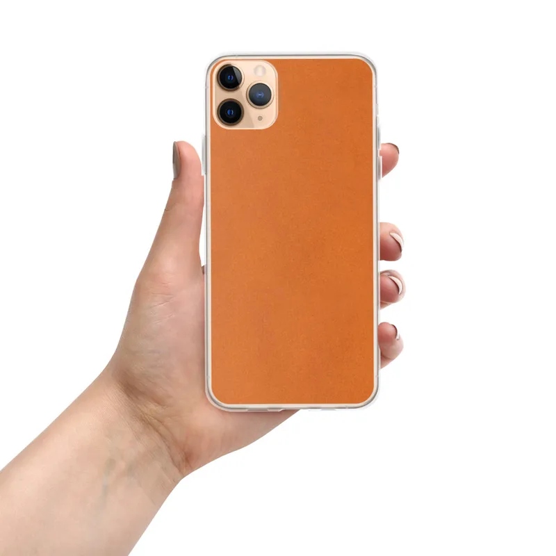Burnt Orange Minimalist Clear Case for iPhone — smooth solid burnt orange surface with subtle warm texture variation