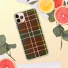 Highland Tartan Clear Case for iPhone — classic Scottish tartan plaid with deep crimson red and forest green blocks crossed