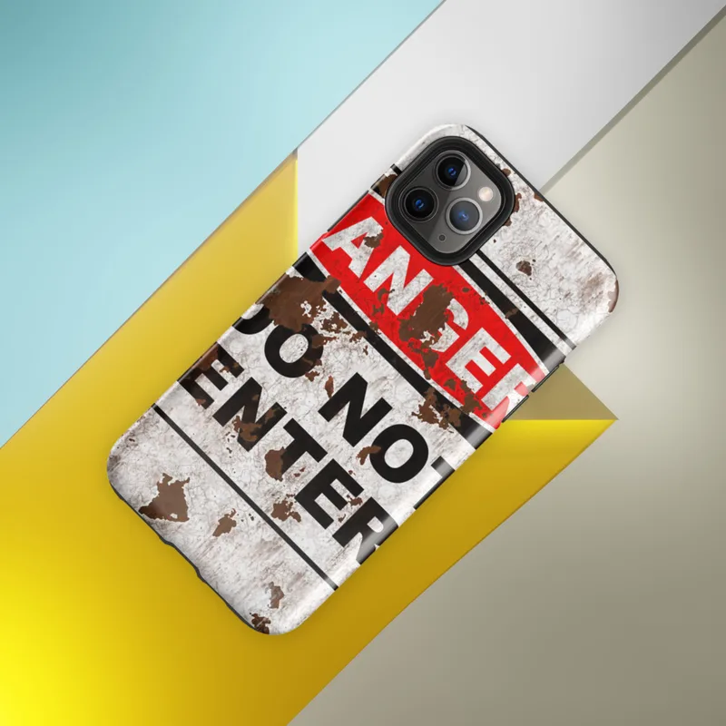 Glossy Danger Do Not Enter Tough Case for iPhone — distressed white rusted metal surface with a bold black-bordered warning