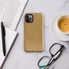 Glossy Golden Warmth Minimalist Tough Case for iPhone — smooth brushed golden amber surface with subtle tonal texture