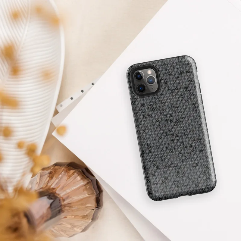 Glossy Dark Chain Mail Armor Tough Case for iPhone — close-up seamless chain mail pattern in dark charcoal and gunmetal