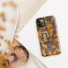 Glossy Circuit Camo Tech Fortress Tough Case for iPhone — dense camouflage pattern of orange and charcoal mechanical circuit