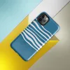 Glossy Ocean Wave Lines Tough Case for iPhone — fluid white wavy horizontal lines layered across a rich teal blue background