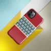 Glossy Crimson Snowflake Border Tough Case for iPhone — teal band of repeating geometric snowflake medallions in cream