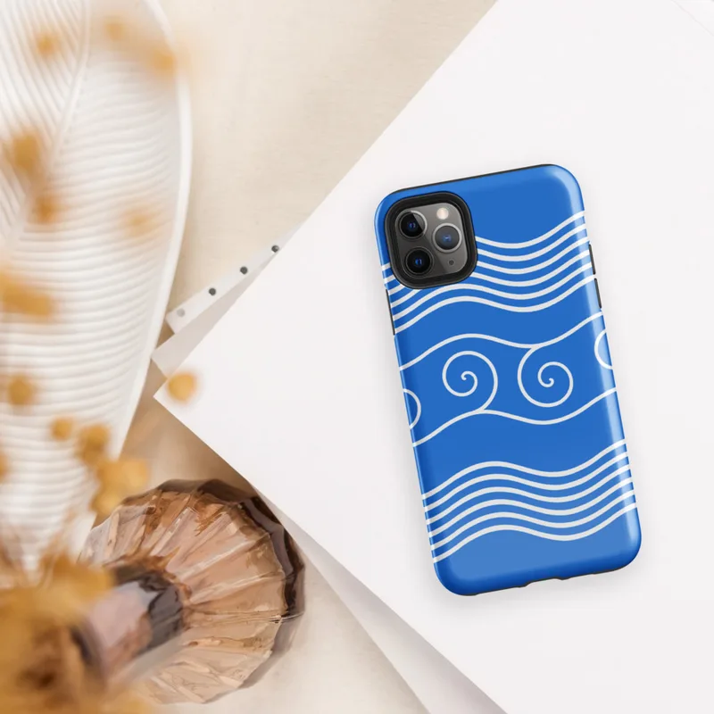 Glossy Ocean Waves Blue Tide Tough Case for iPhone — white flowing wave lines and spiral scroll crests repeating across