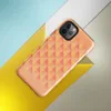 Glossy Warm Geometric Triangle Pattern Tough Case for iPhone — repeating pinwheel triangles in coral, golden yellow, peach