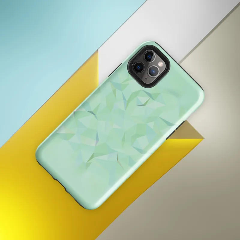 Glossy Mint Crystal Geometric Tough Case for iPhone — low-poly geometric triangles in soft mint, sage, seafoam, and pale