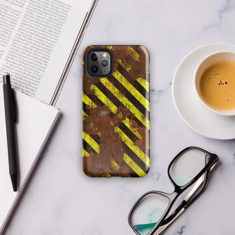 Glossy Rusted Hazard Zone Tough Case for iPhone — weathered rust-brown metal surface covered in diagonal yellow and black