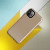 Glossy Warm Sand Minimal Tough Case for iPhone — smooth warm sand beige surface with subtle light speckles and soft tonal