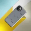 Glossy Steel Panel Industrial Tough Case for iPhone — repeating grey steel panel pattern with dark circular rivets arranged