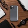 Glossy Dark Grid Minimal Tough Case for iPhone — uniform grid of dark charcoal square tiles with subtle tonal variation
