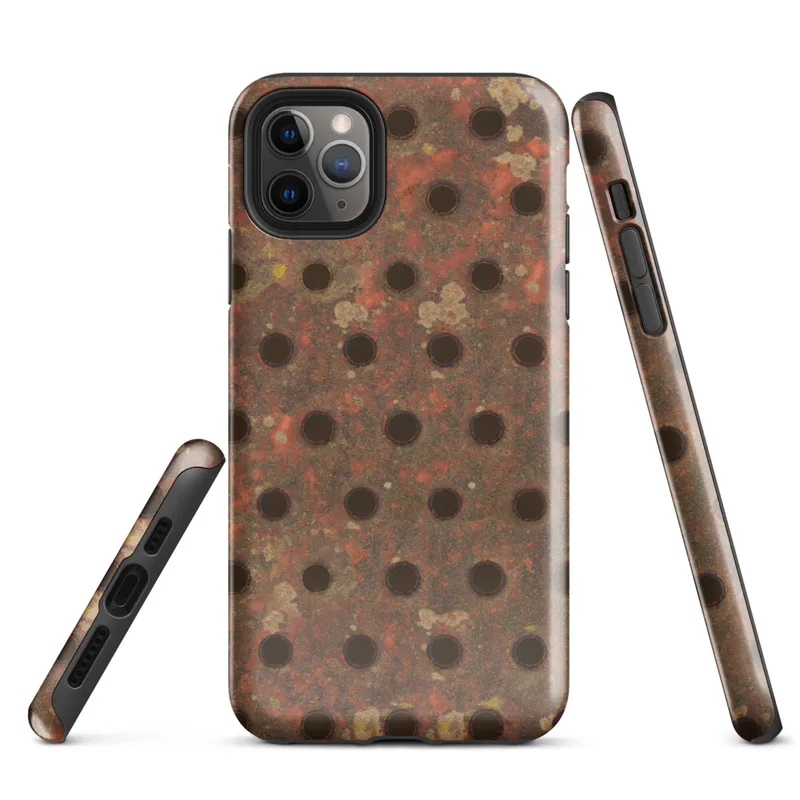Glossy Industrial Rust Perforated Metal Tough Case for iPhone — close-up of heavily rusted perforated steel plate with rows