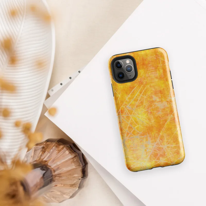 Glossy Solar Flare Scratch Art Tough Case for iPhone — mottled golden orange and yellow background with layered silver