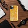 Glossy Solar Flare Scratch Art Tough Case for iPhone — mottled golden orange and yellow background with layered silver