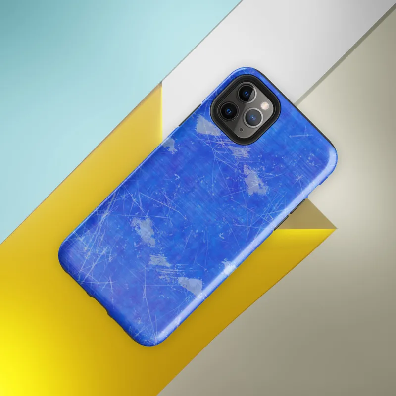 Glossy Electric Blue Splatter Storm Tough Case for iPhone — vivid cobalt blue textured surface covered in scattered white