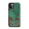 Glossy Copper Patina Storm Tough Case for iPhone — seamless oxidized copper surface with teal-green verdigris patina