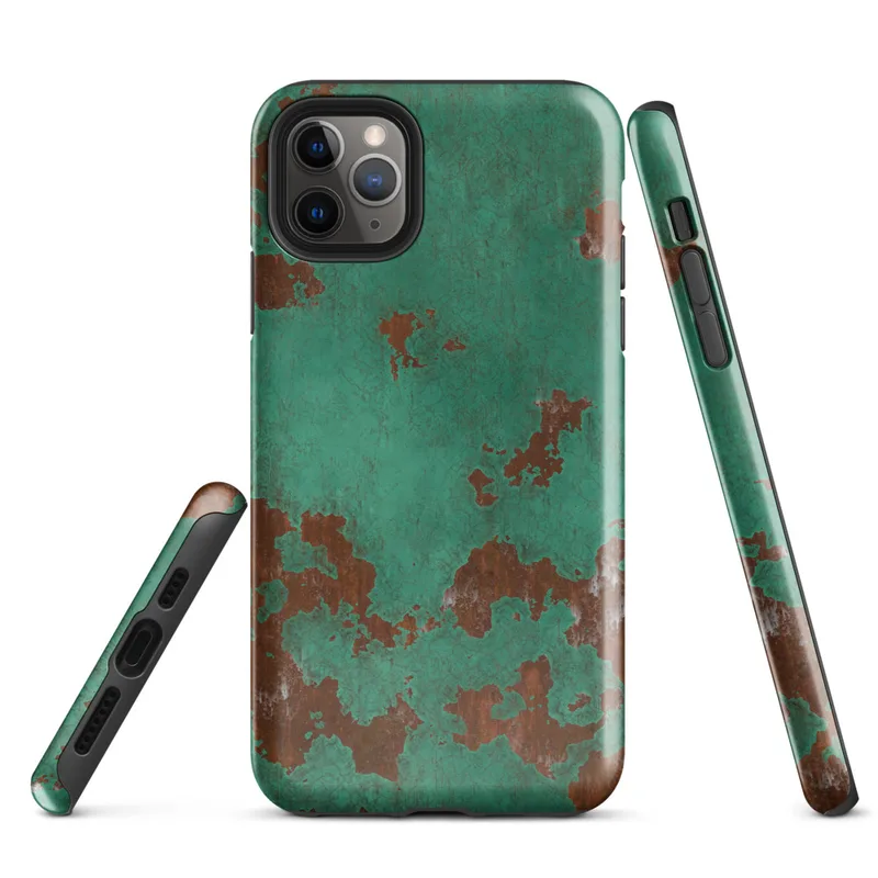Glossy Copper Patina Storm Tough Case for iPhone — seamless oxidized copper surface with teal-green verdigris patina