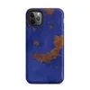 Matte Cobalt Rust Industrial Edge Tough Case for iPhone — abstract rusted metal texture with irregular burnt sienna