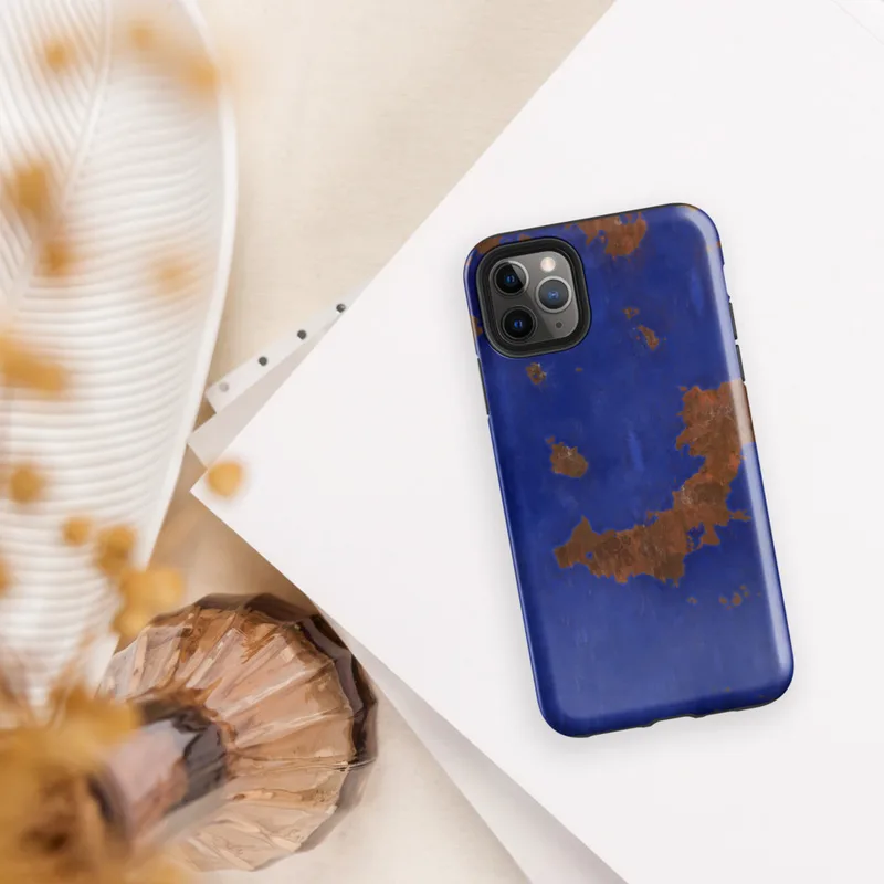 Glossy Cobalt Rust Industrial Edge Tough Case for iPhone — abstract rusted metal texture with irregular burnt sienna