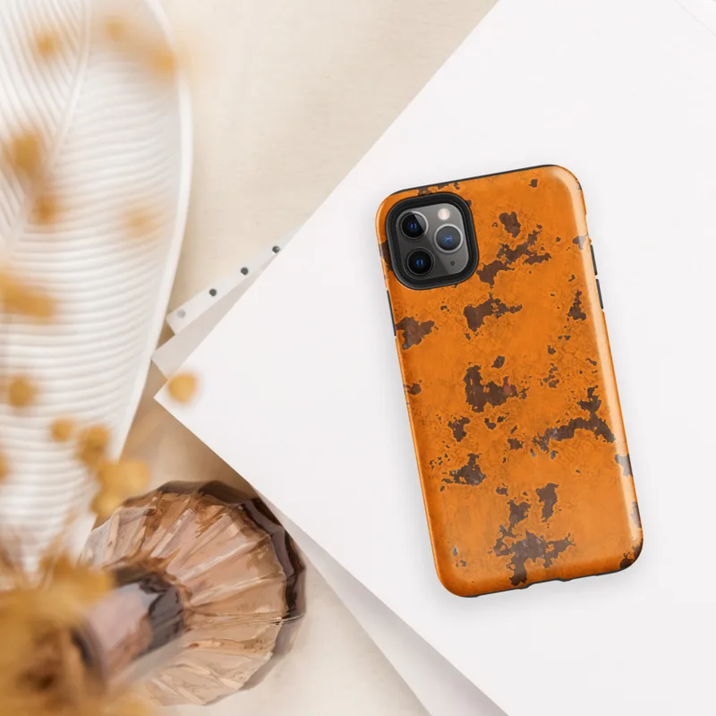 Glossy Rust Never Sleeps Tough Case for iPhone — heavily rusted orange painted metal surface with dark brown corroded