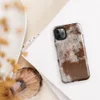 Glossy Rust and Ruin Tough Case for iPhone — peeling white paint over deep rust-red corroded iron metal surface with streaks