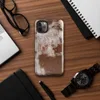 Glossy Rust and Ruin Tough Case for iPhone — peeling white paint over deep rust-red corroded iron metal surface with streaks