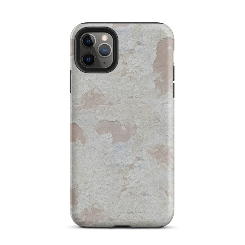 Matte Ancient Walls Weathered Plaster Tough Case for iPhone — close-up of aged plaster wall with peeling cream and chalky
