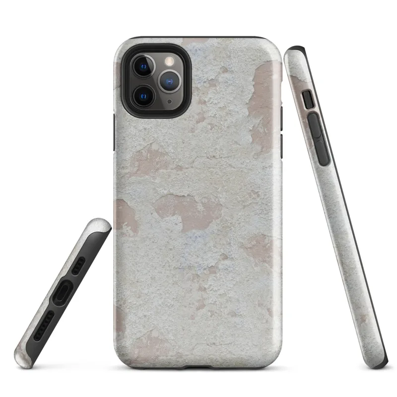 Glossy Ancient Walls Weathered Plaster Tough Case for iPhone — close-up of aged plaster wall with peeling cream and chalky