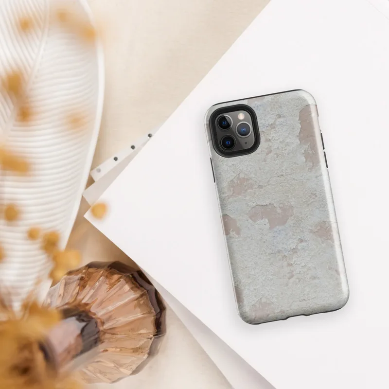 Glossy Ancient Walls Weathered Plaster Tough Case for iPhone — close-up of aged plaster wall with peeling cream and chalky