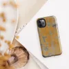 Glossy Urban Decay Peeling Wall Tough Case for iPhone — aged wall with peeling amber and golden-orange paint revealing grey