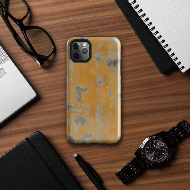 Glossy Urban Decay Peeling Wall Tough Case for iPhone — aged wall with peeling amber and golden-orange paint revealing grey