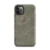 Matte Weathered Plaster Wall Tough Case for iPhone — close-up of aged sage green plaster peeling away in irregular patches
