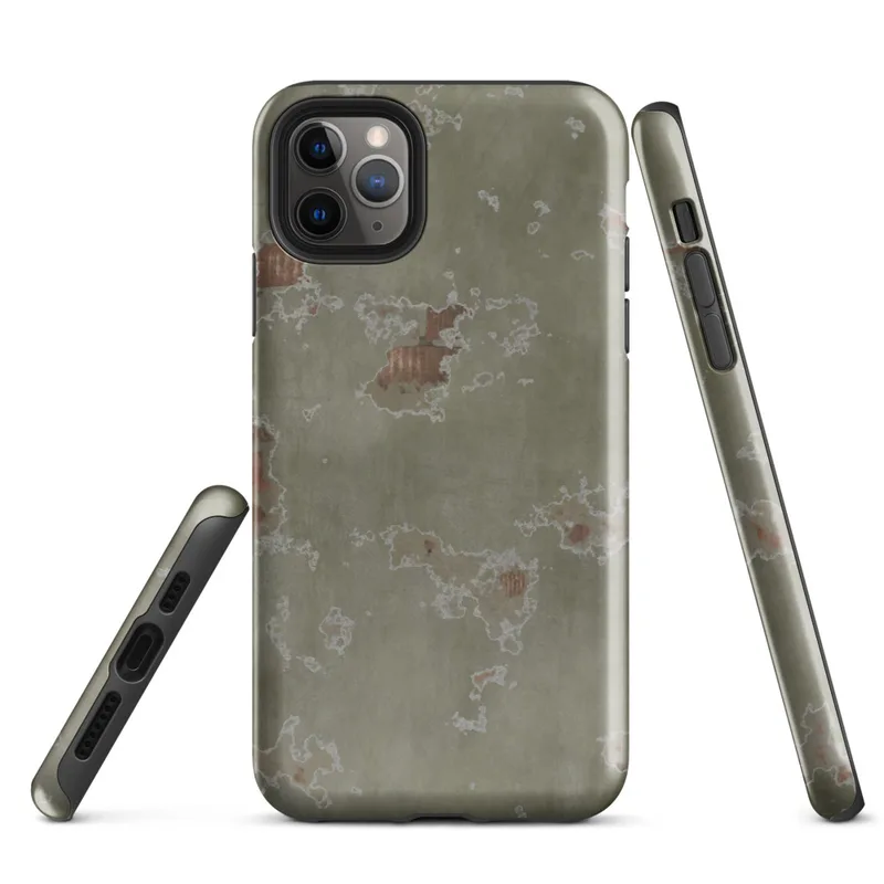 Glossy Weathered Plaster Wall Tough Case for iPhone — close-up of aged sage green plaster peeling away in irregular patches